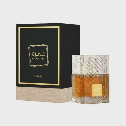 Lattafa Khamrah unisex EDP spray bottle, 3.4 oz, featuring elegant packaging for men and women, with a stylish design.