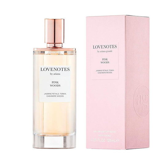 Ariana Grande Lovenotes Pink Woods EDP spray for women, featuring a pink floral bottle with floral and woody scent notes.