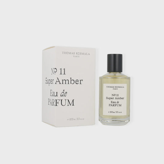 Thomas Kosmala Super Amber No. 11 unisex Eau de Parfum bottle with amber-colored liquid and elegant packaging.